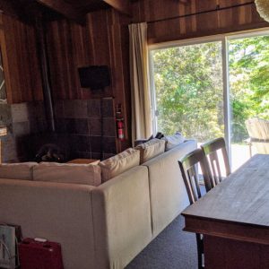 Andiron-seaside-cabin-table-gay-friendly